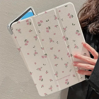 Transparent floral print hard case for iPad with tri-fold magnetic front cover acting as a kickstand.