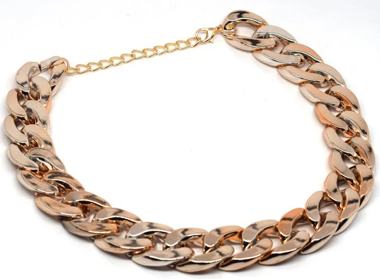 Gold colour twisted chain dog collar with an adjustable buckle for small to medium-sized dogs.