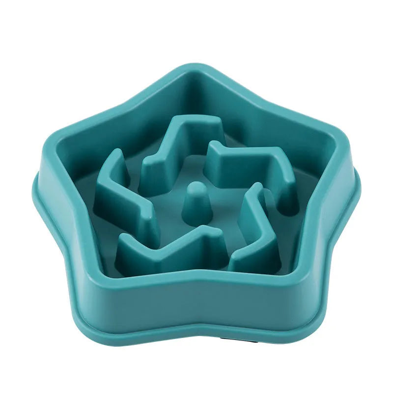 Yellow plastic slow feeding dog bowl with raised obstacles at base to prevent choking