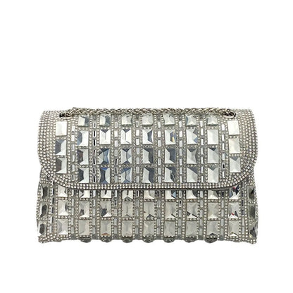 Silver rhinestone-decorated PU leather clutch bag with a metal chain strap, shown open to reveal interior phone pocket.