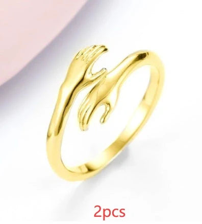 Adjustable Alloy Hands Hug Ring in silver and gold with unique geometry design