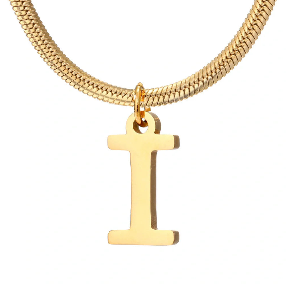 Elegant gold A-Z letter pendant necklace on a snake chain