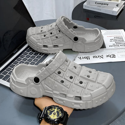 Men's sand-coloured EVA slippers with thick sole, hole design, and toe holder.