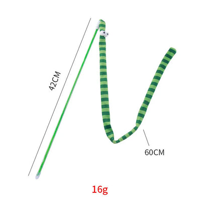 Interactive cat wand toy with a polycarbonate handle and a long green plush strip with a bell.