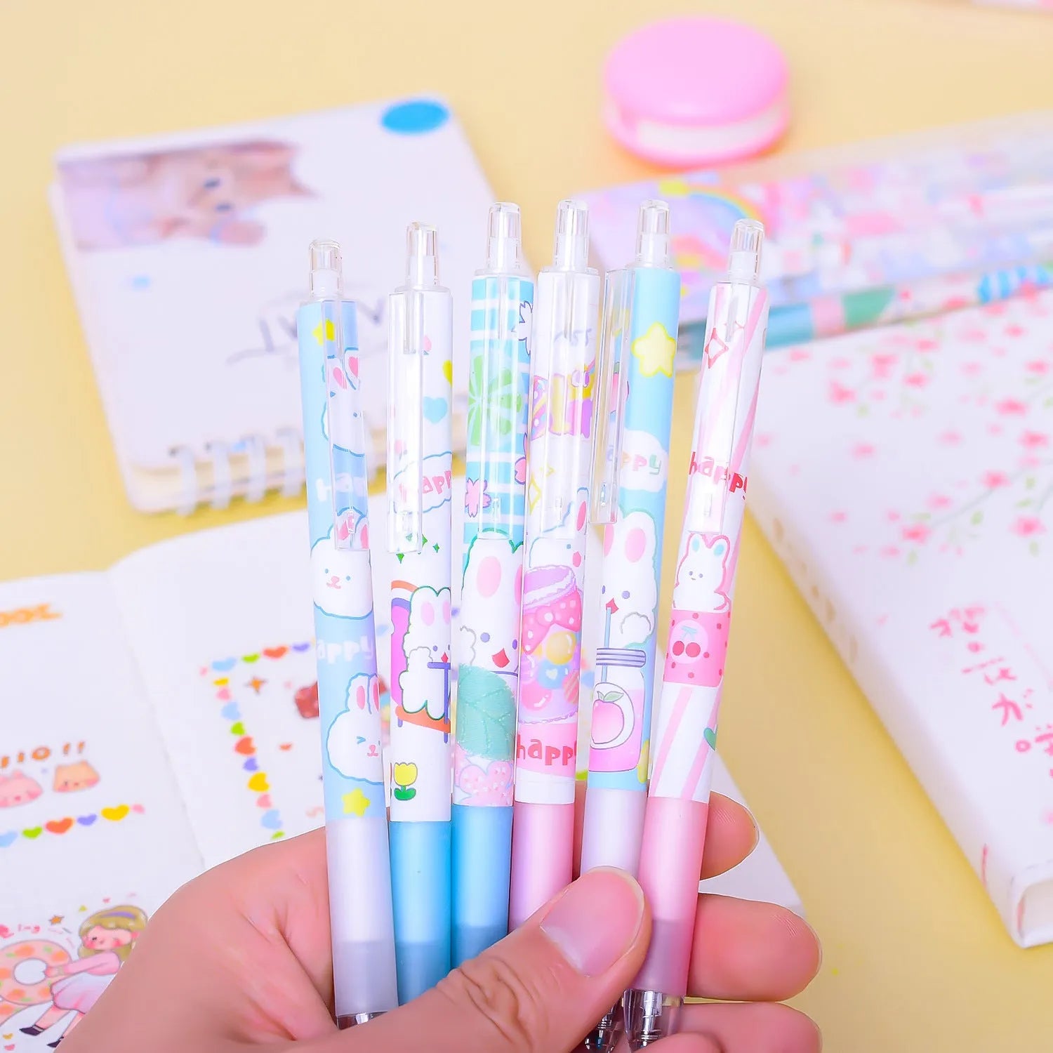 Six cartoon bunny design ballpoint pens with black ink and 0.5mm tips in packaging