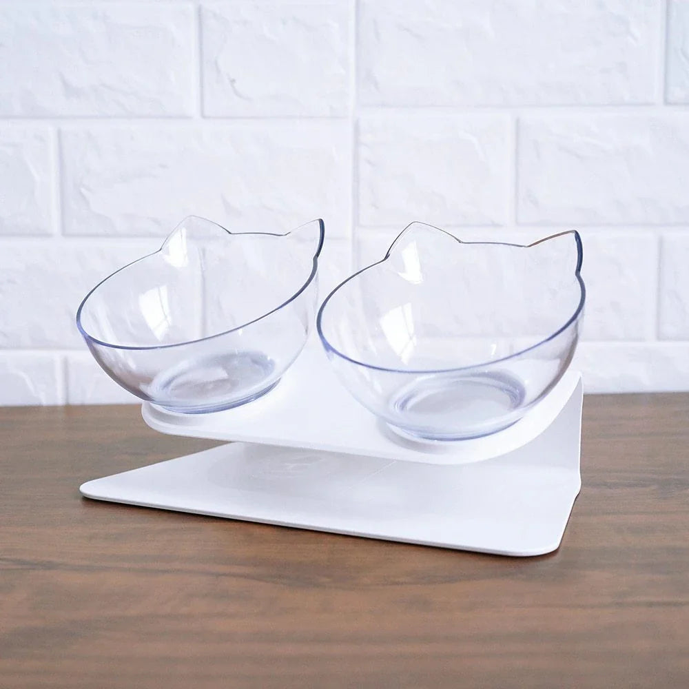 Tilted cat and dog bowls with raised stand, designed to reduce neck strain and protect cervical vertebrae.