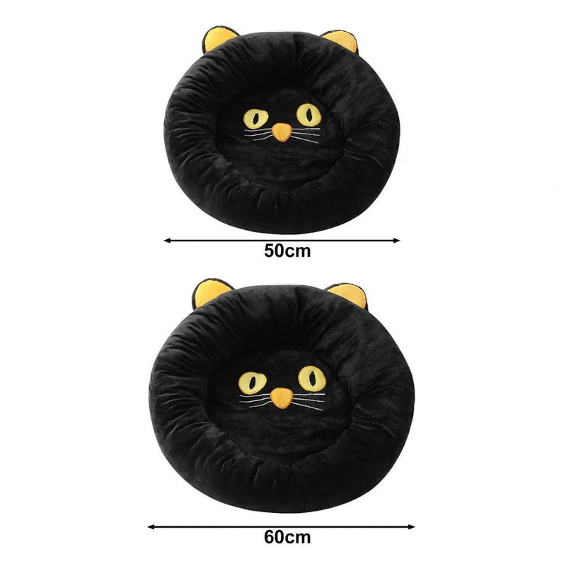 Black cat shape velvet pet nest bed for cats available in S and M sizes with soft material, raised edge support, and stain-resistant properties to provide a comfortable sleeping spot.