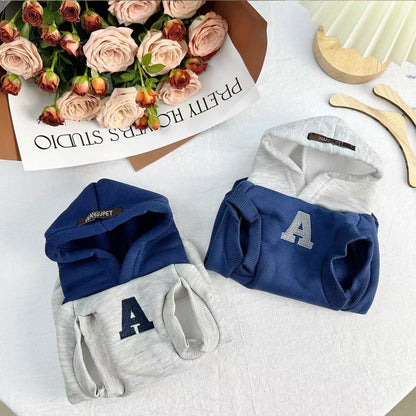 Blue and grey-white slim-fitting hooded sweater for dogs or cats with reflective lettering.