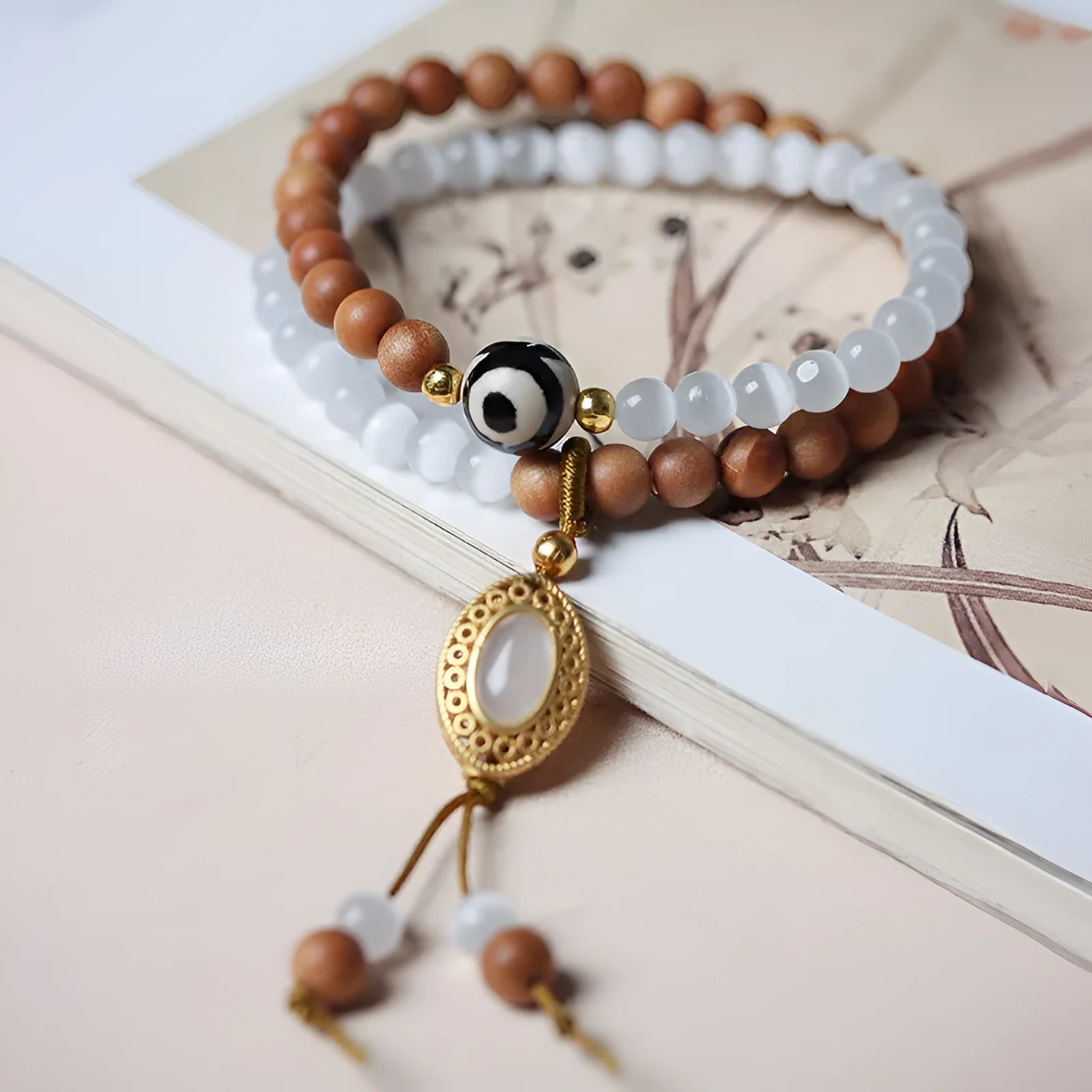 Sandalwood double ring and Opal Tibetan bead bracelet with polished finish