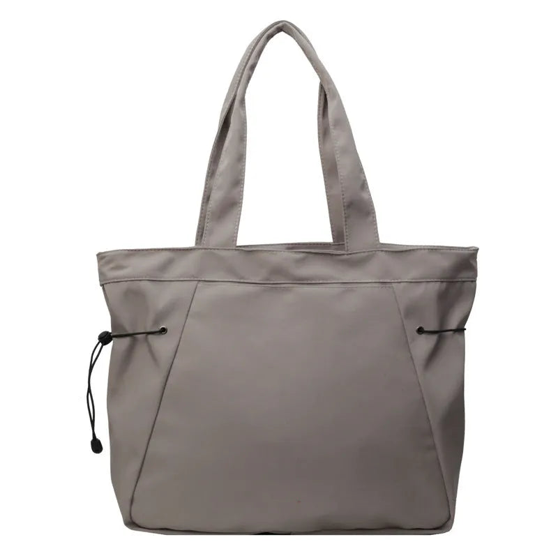 Soft Oxford cloth foldable commuter tote bag in street trend style, shown in available colours.