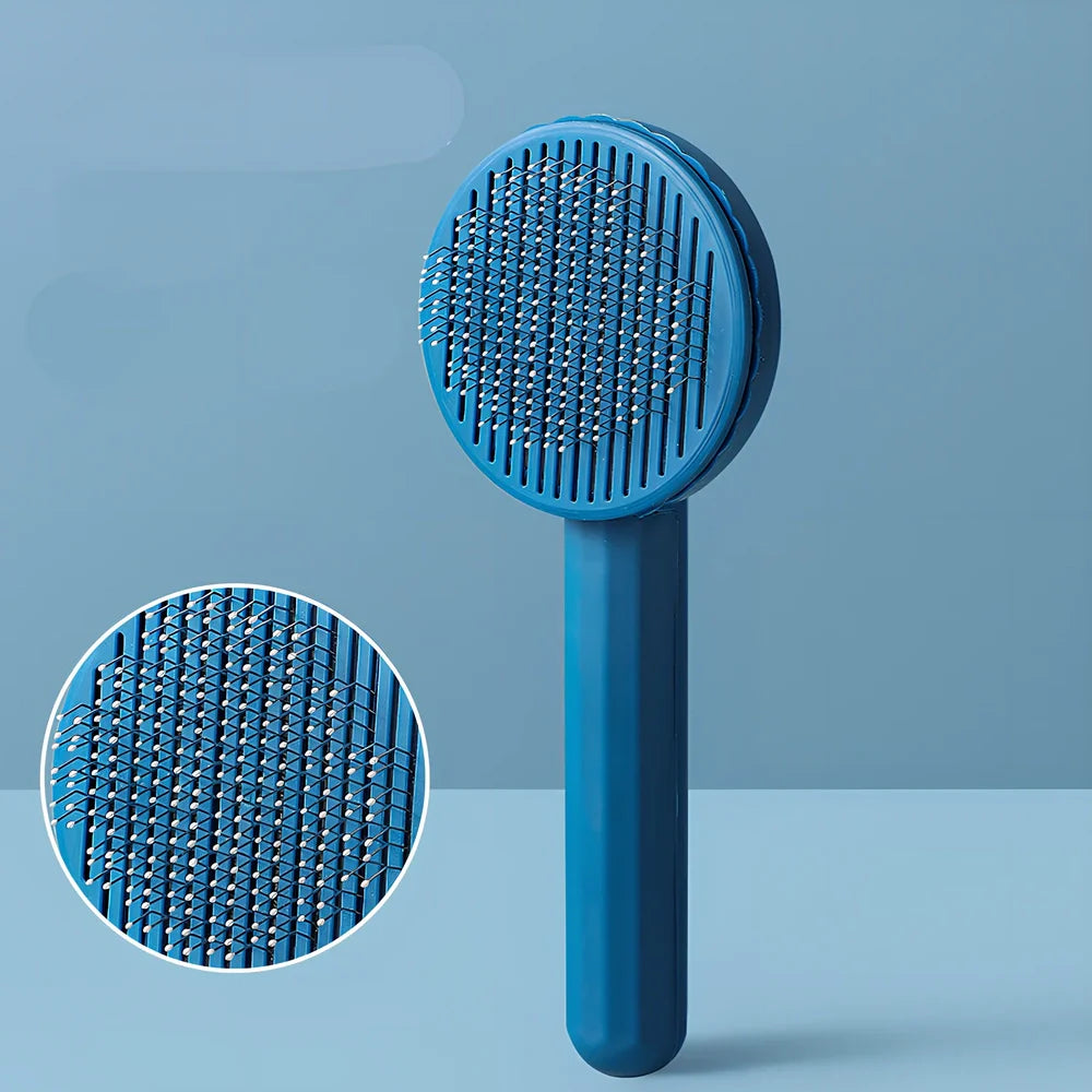 Self-cleaning cat comb with floating needle teeth and built-in hair storage chamber in assorted colours