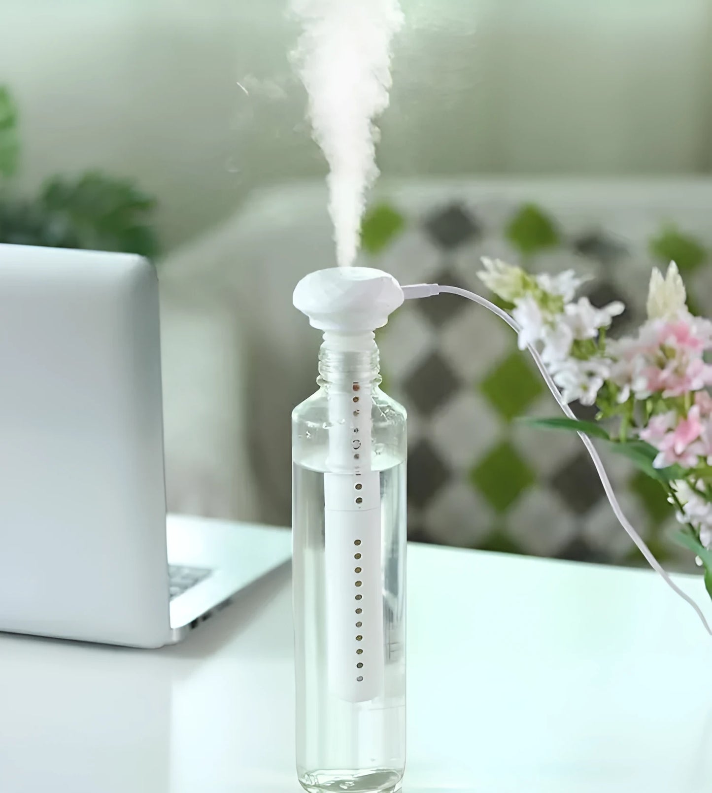 White columnar USB humidifier diffuser with 54mm diameter next to car cup holder
