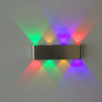 Silver rectangular aluminium LED wall lamp showing multi-colour light options.