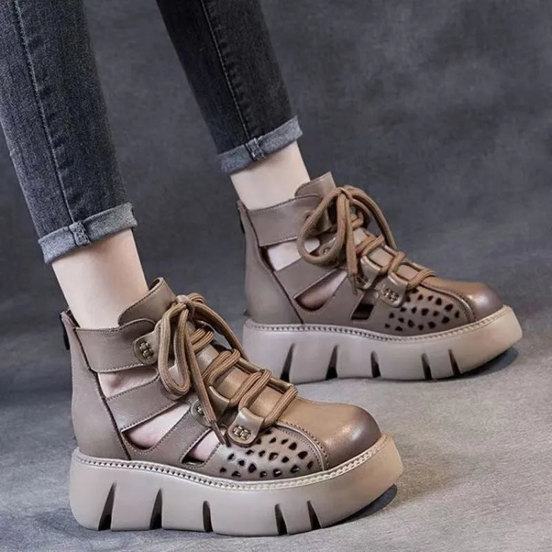 Women's platform sandals with hollow hole design in soft cowhide leather, shown in black colour with sporty styling