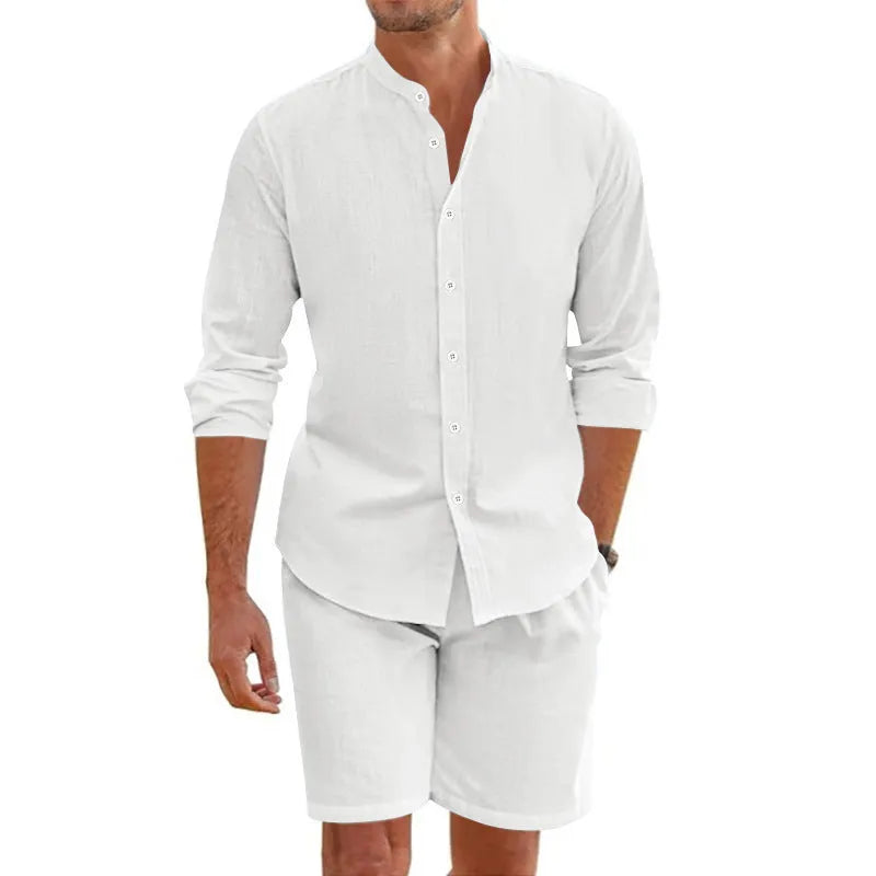 Man wearing a light blue short sleeve lapel shirt and matching drawstring shorts from a summer shirt suit.