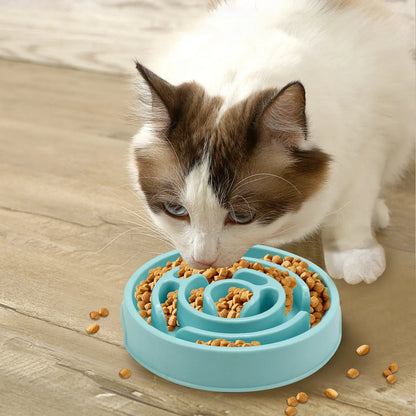 Blue silicone slow feeder dog bowl with raised labyrinth puzzle pattern for dogs.