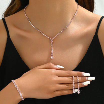 Rhinestone heart pendant jewellery set with necklace, bracelet and earrings in silver pink colour