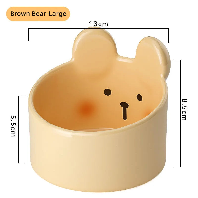 Blush Critter ceramic pet bowls in white rabbit and brown bear designs, showing neck protection rim.