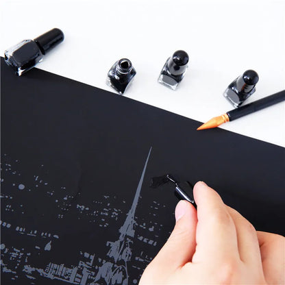 Diamond painting repair tool set with metal scraper pen, bottle of adhesive liquid, soft brush, and bamboo stick on a craft table