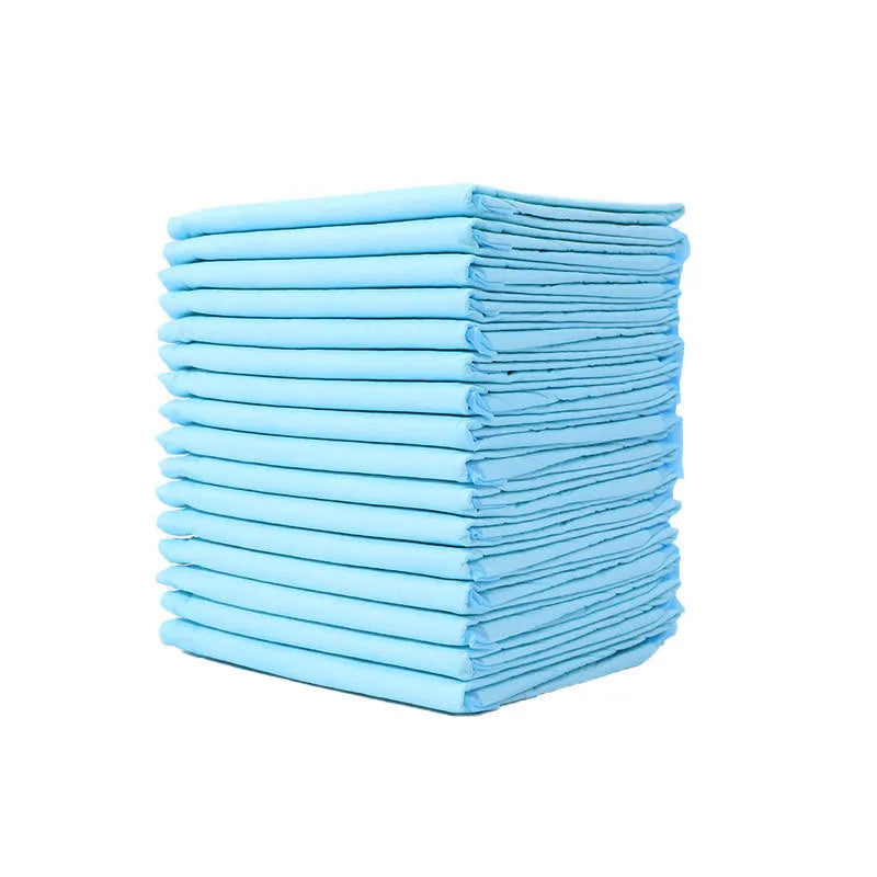 Pack of disposable pet urinal pads showing layered construction and size options S, M, L, XL for dogs and cats.