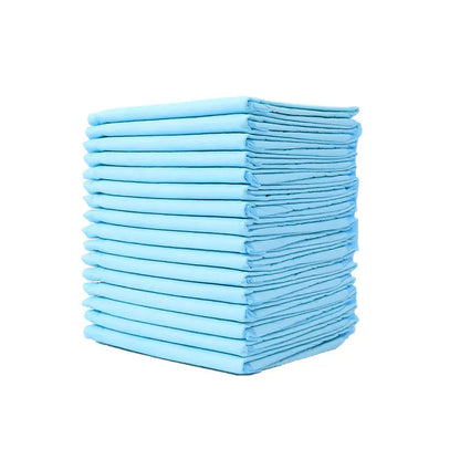 Pack of disposable pet urinal pads showing layered construction and size options S, M, L, XL for dogs and cats.