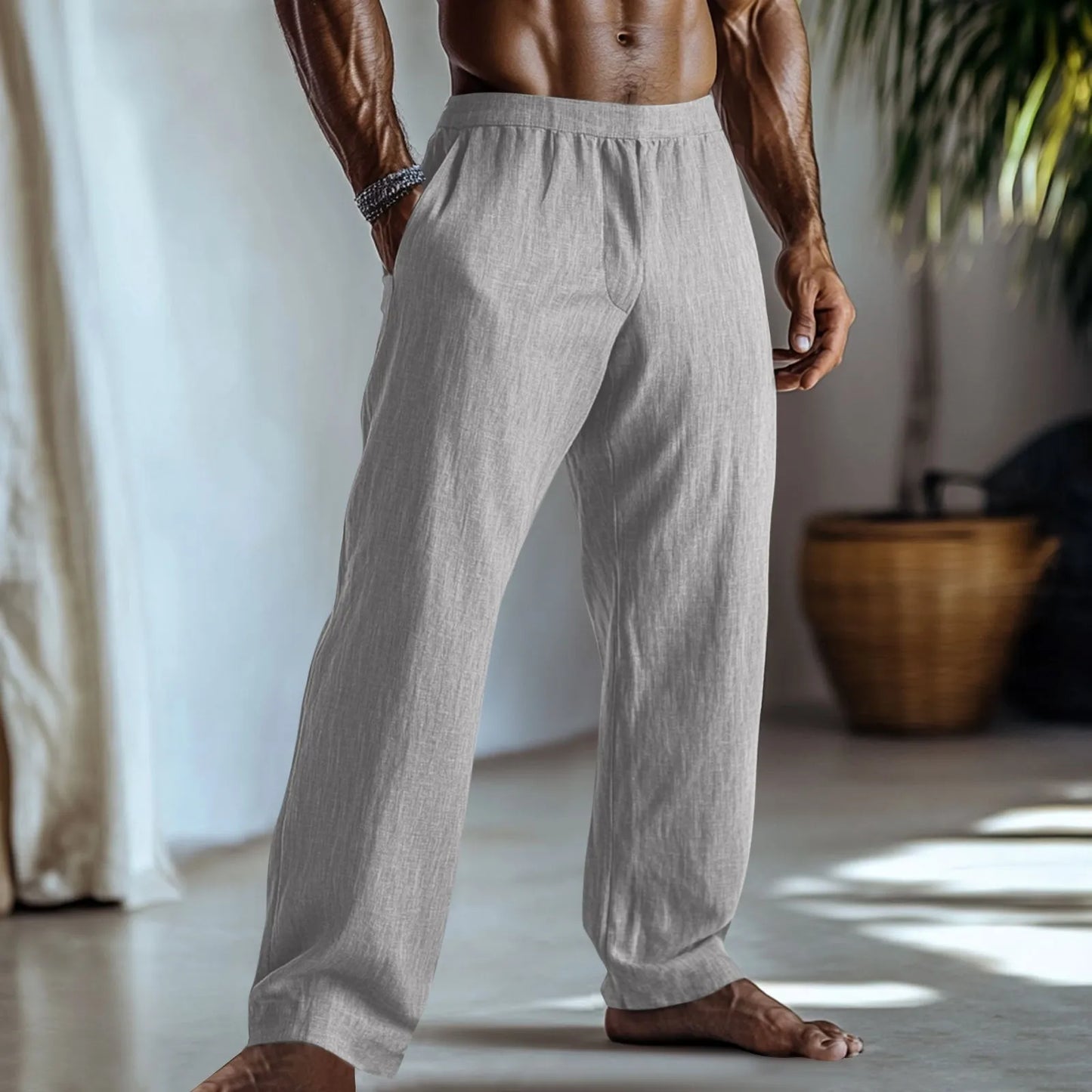 Straight leg cotton linen trousers in light green, shown with side pockets and a casual fit.