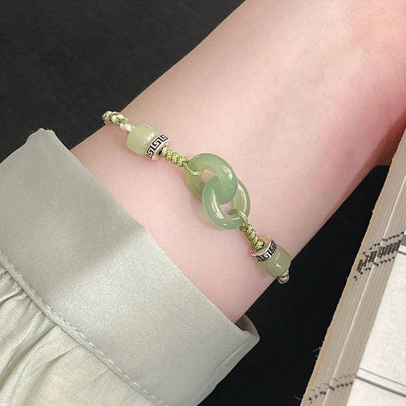 Green jade colour woven women's bracelet with a copper peace buckle and double ring design