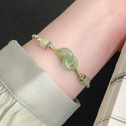 Green jade colour woven women's bracelet with a copper peace buckle and double ring design