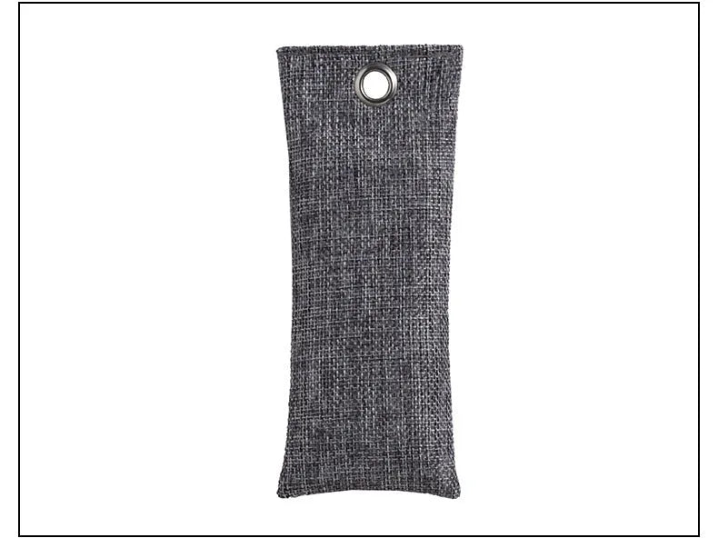 Set of black, green, grey, and blue rectangular bamboo charcoal deodorising bags on a white surface.