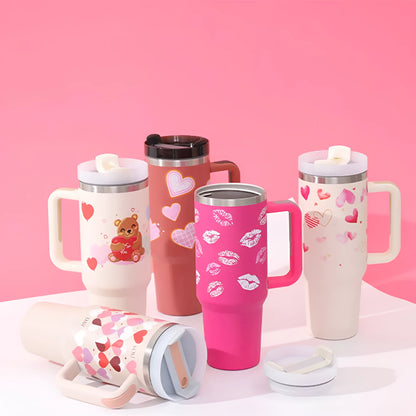 40oz stainless steel tumbler with handle and straw in various colour options showing tapered shape and spill-proof lid