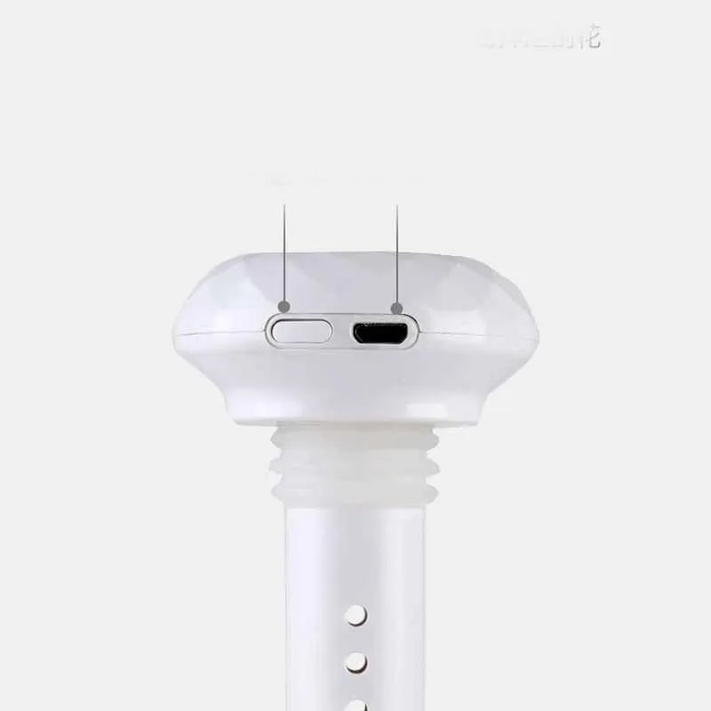 White columnar USB humidifier diffuser with 54mm diameter next to car cup holder