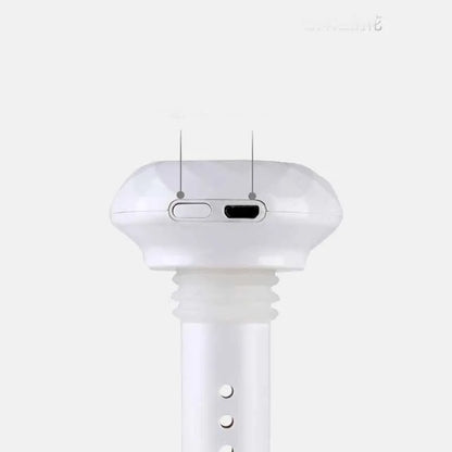White columnar USB humidifier diffuser with 54mm diameter next to car cup holder