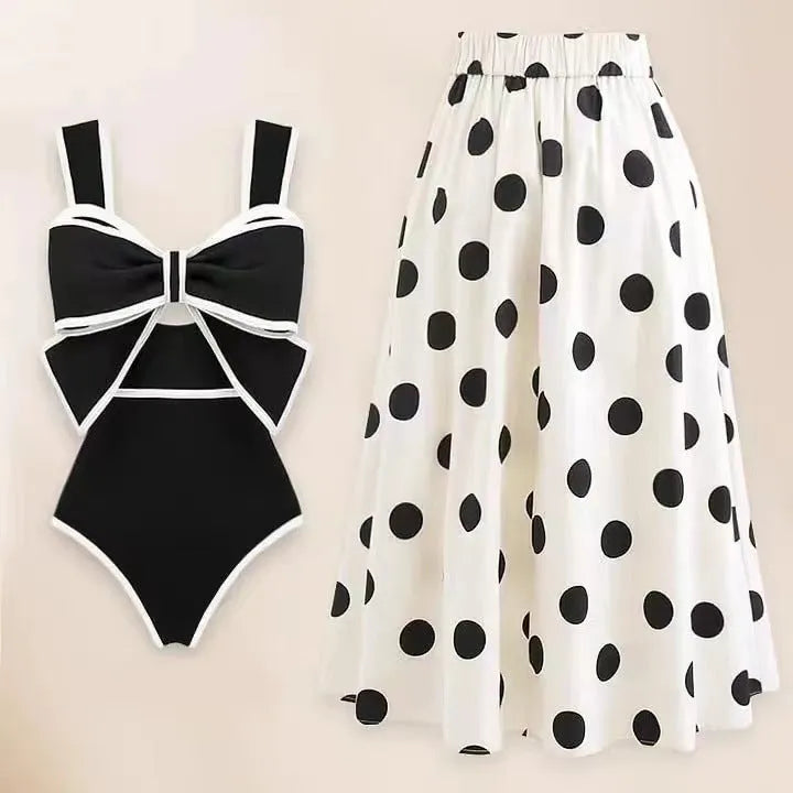 Women's one-piece swimsuit with attached round skirt and decorative bow, polyester beach dress for swimming and wading, available in black or white colour options and sizes S, M, L, XL