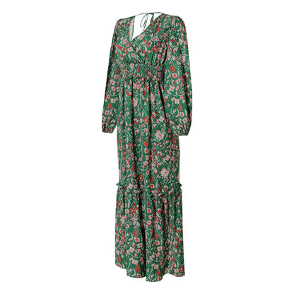 Elegant green printed halter dress with flared sleeves, made of high-quality polyester fabric