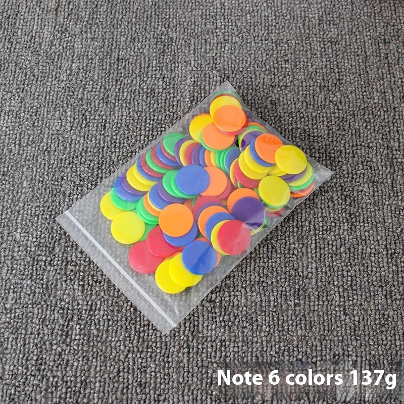 Bag of 100 plastic counting chips in 19mm or 25mm size, solid colour or transparent, for children aged 4 to 6