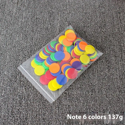 Bag of 100 plastic counting chips in 19mm or 25mm size, solid colour or transparent, for children aged 4 to 6