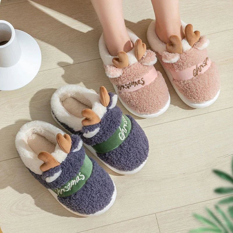 Cozy elk-themed winter home slippers in various candy colors with soft suede upper and supportive EVA sole