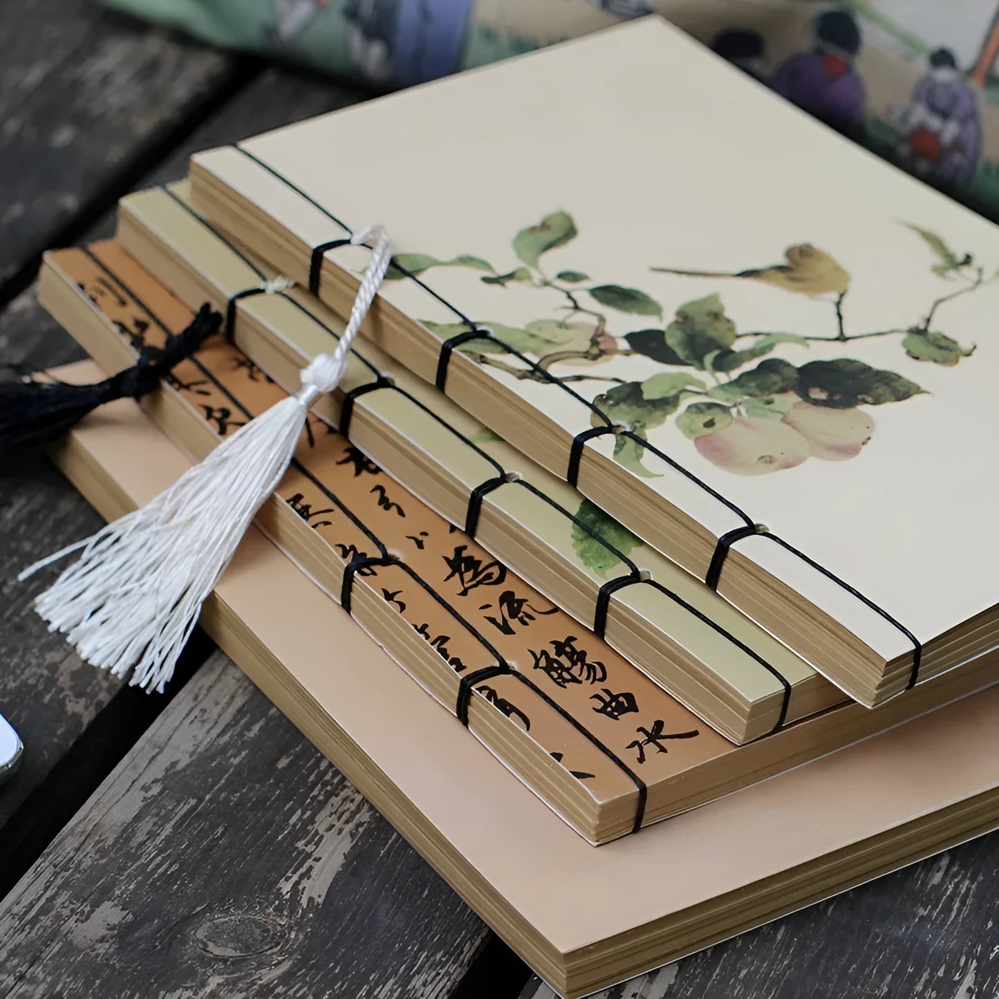 A5 antique wire-bound notebook with classical artwork cover, black oil wax rope binding, and decorative tassels
