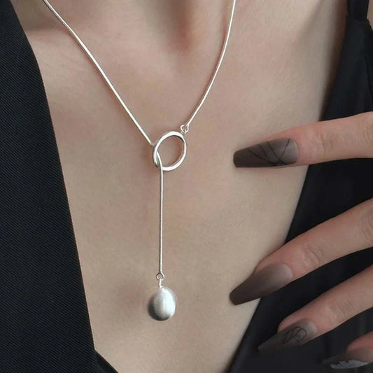 Elegant platinum-plated round ball chain necklace with sleek snake-bone design, a timeless fashion accessory for modern women.