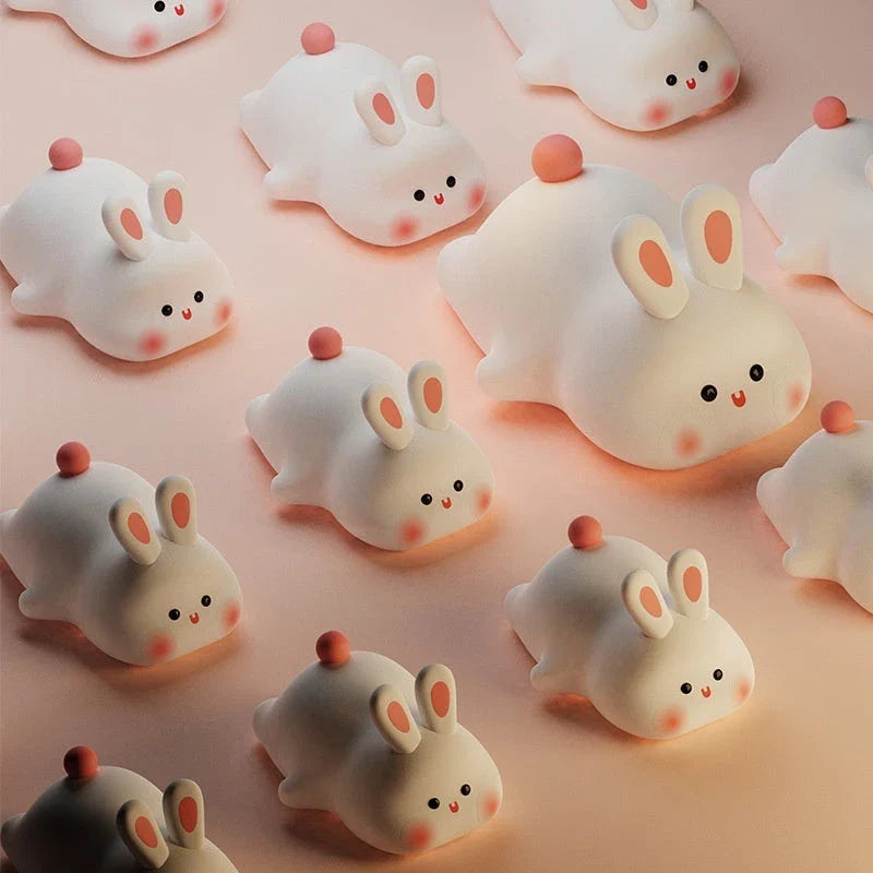 Adorable LED night light with soft silicone design and rabbit face, perfect for kids' bedrooms