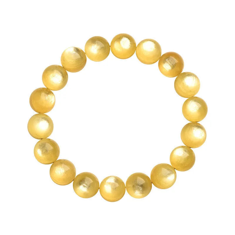 Yellow golden dragon mica round beads bracelet with polished geometric beads on a string.