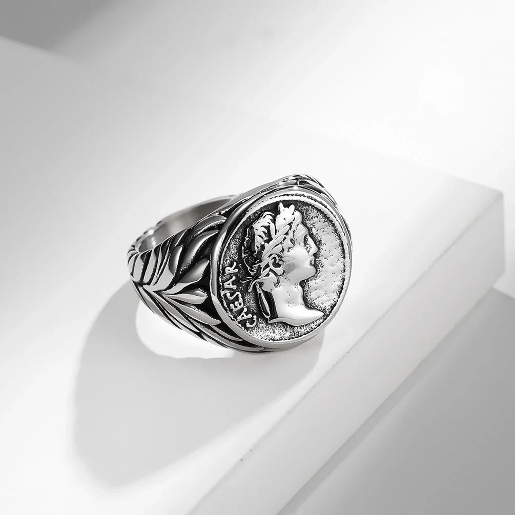 Dashing stainless steel ring with a sleek geometric design, available in steel and gold finishes and a range of sizes