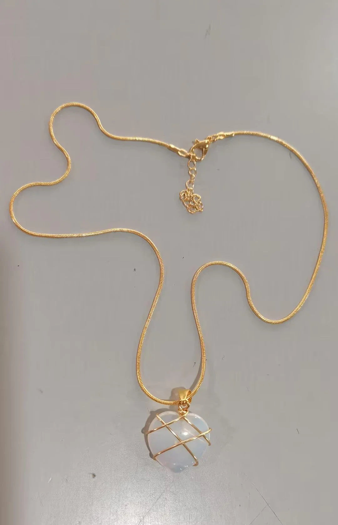 Elegant gold-plated moonstone necklace with a heart-shaped pendant, perfect for fashionable women and girls