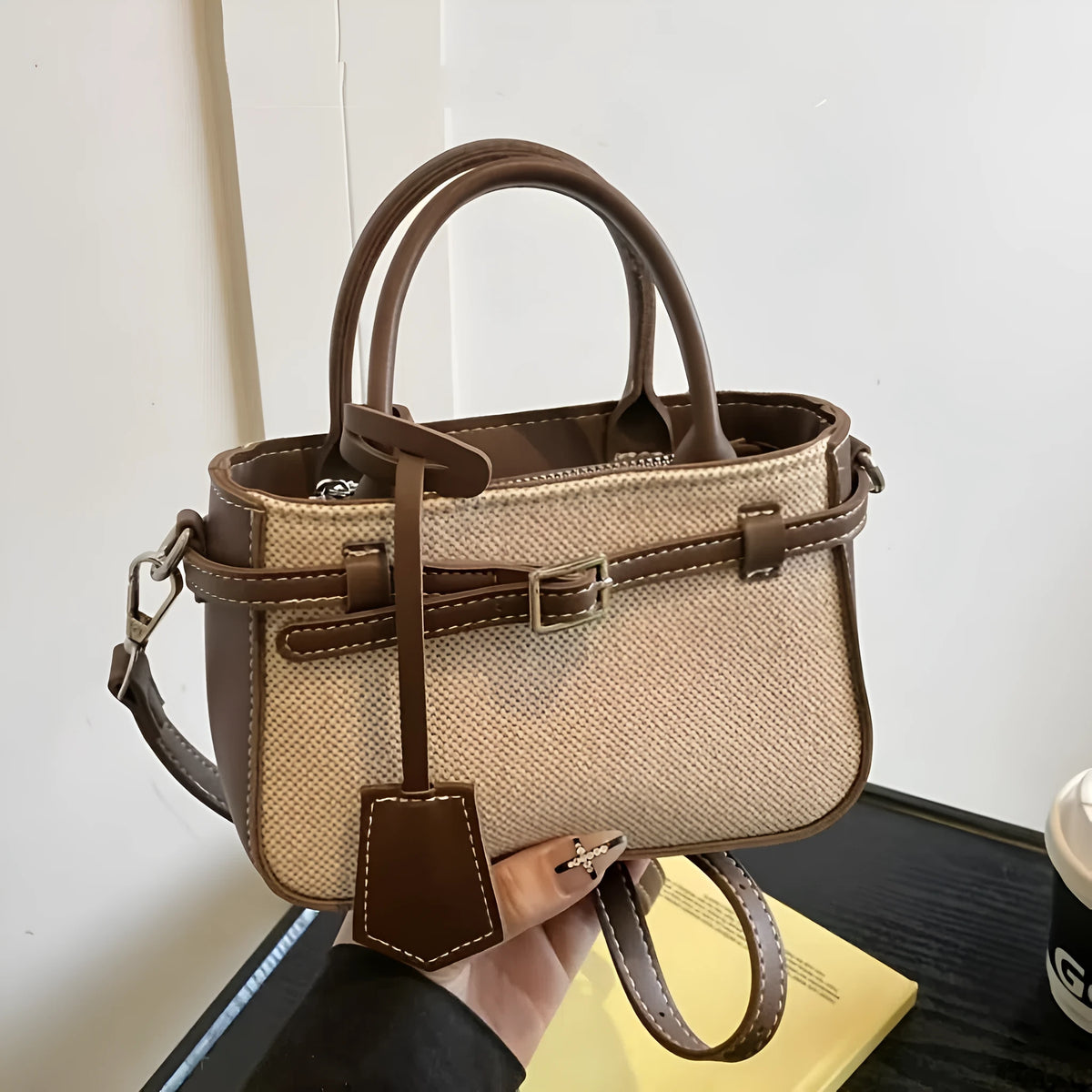 Brown PVC crossbody tote bag with suede lining, single strap, 17.5 x 11.5 x 7.5 cm vertical rectangular shape.