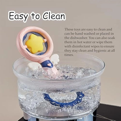 Set of four pink interactive dog toys for aggressive chewers with dental cleaning textures