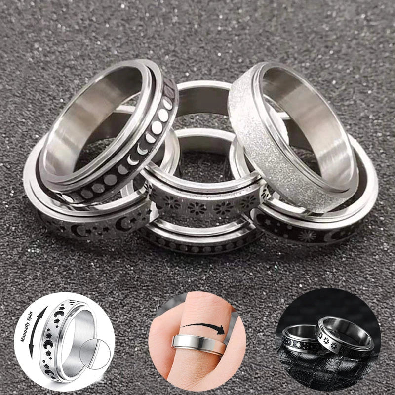 Rotatable stainless steel spinner ring with moon and star designs for anxiety relief and style