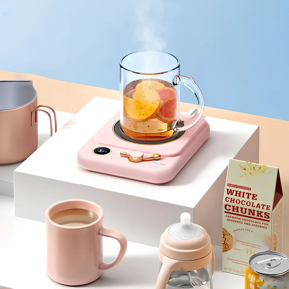 White plated collage desktop warming pad with digital temperature display showing current heating status