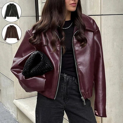 A stylish faux leather jacket with a zipper closure and lapel, available in burgundy and black colors.