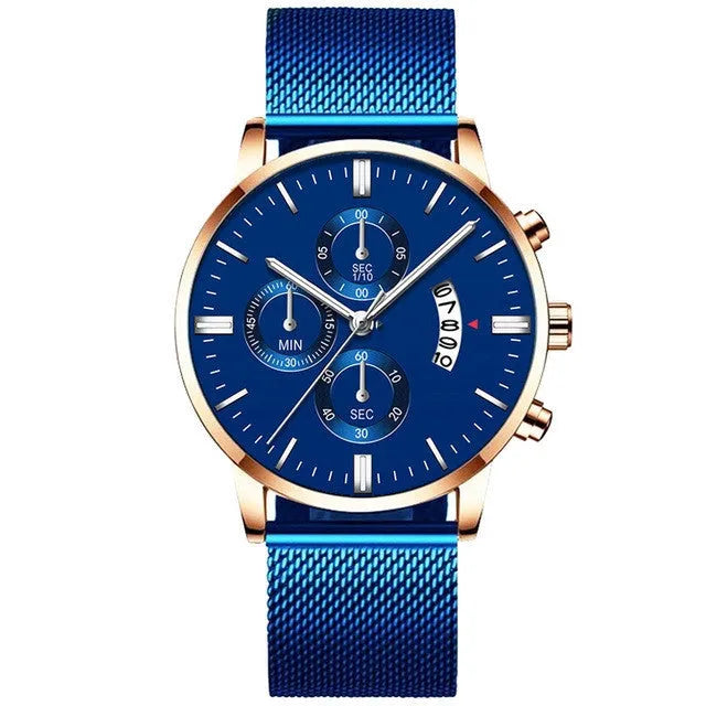Men's stainless steel mesh band quartz watch with analog dial on a wrist.