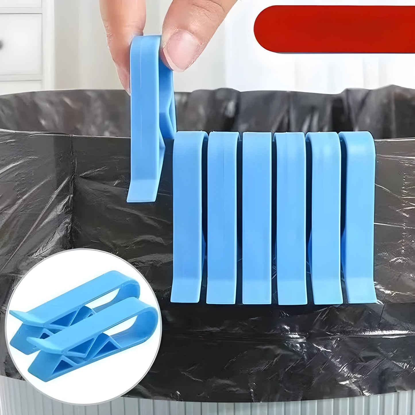 A white polypropylene plastic clip for holding a rubbish bag onto the rim of a bin.